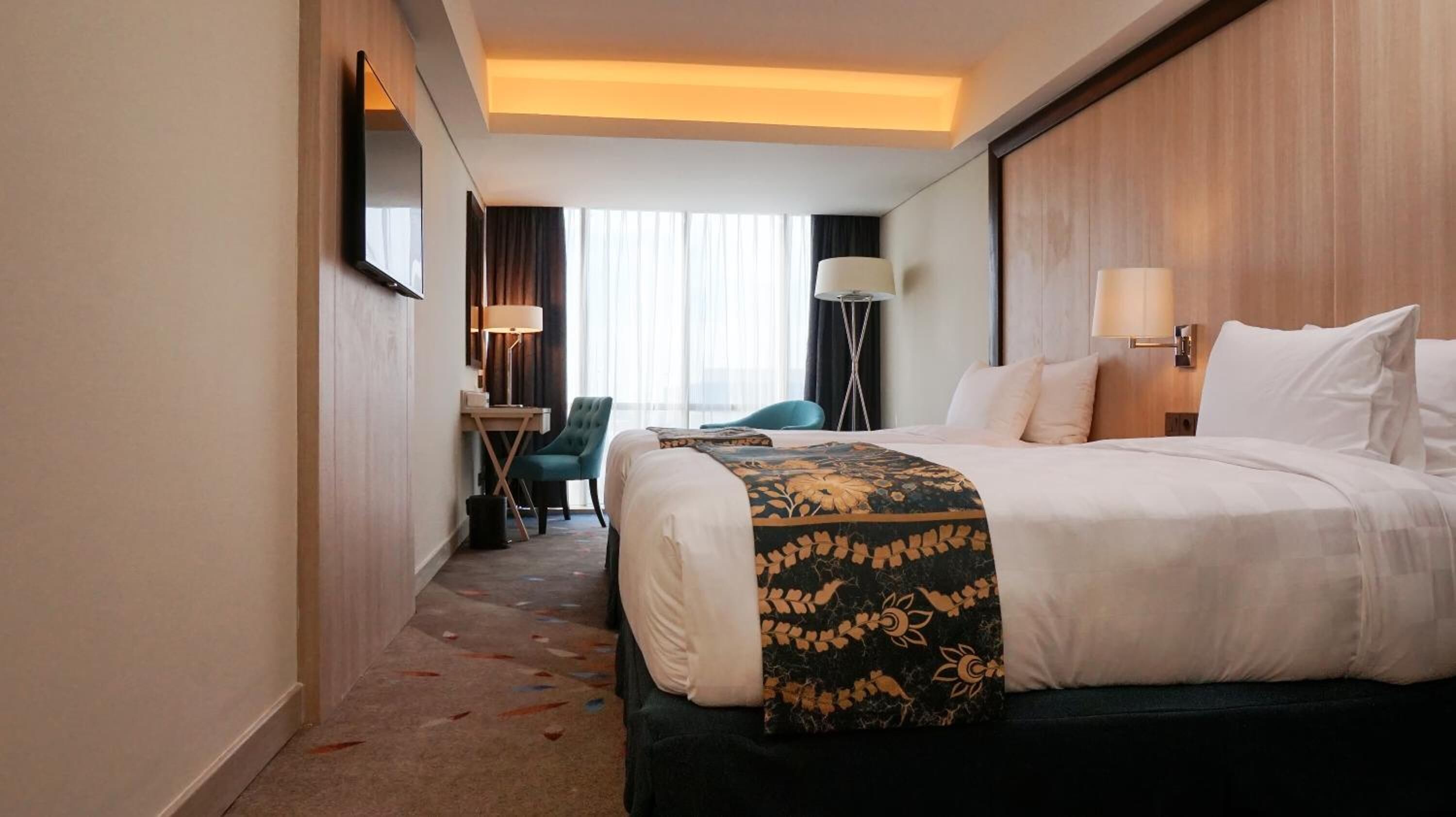 deluxe twin room | in-room safe, desk, blackout curtains, free wifi