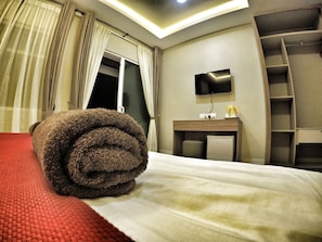 Frigobar, escrivaninha, Wi-Fi de cortesia, roupa de cama
