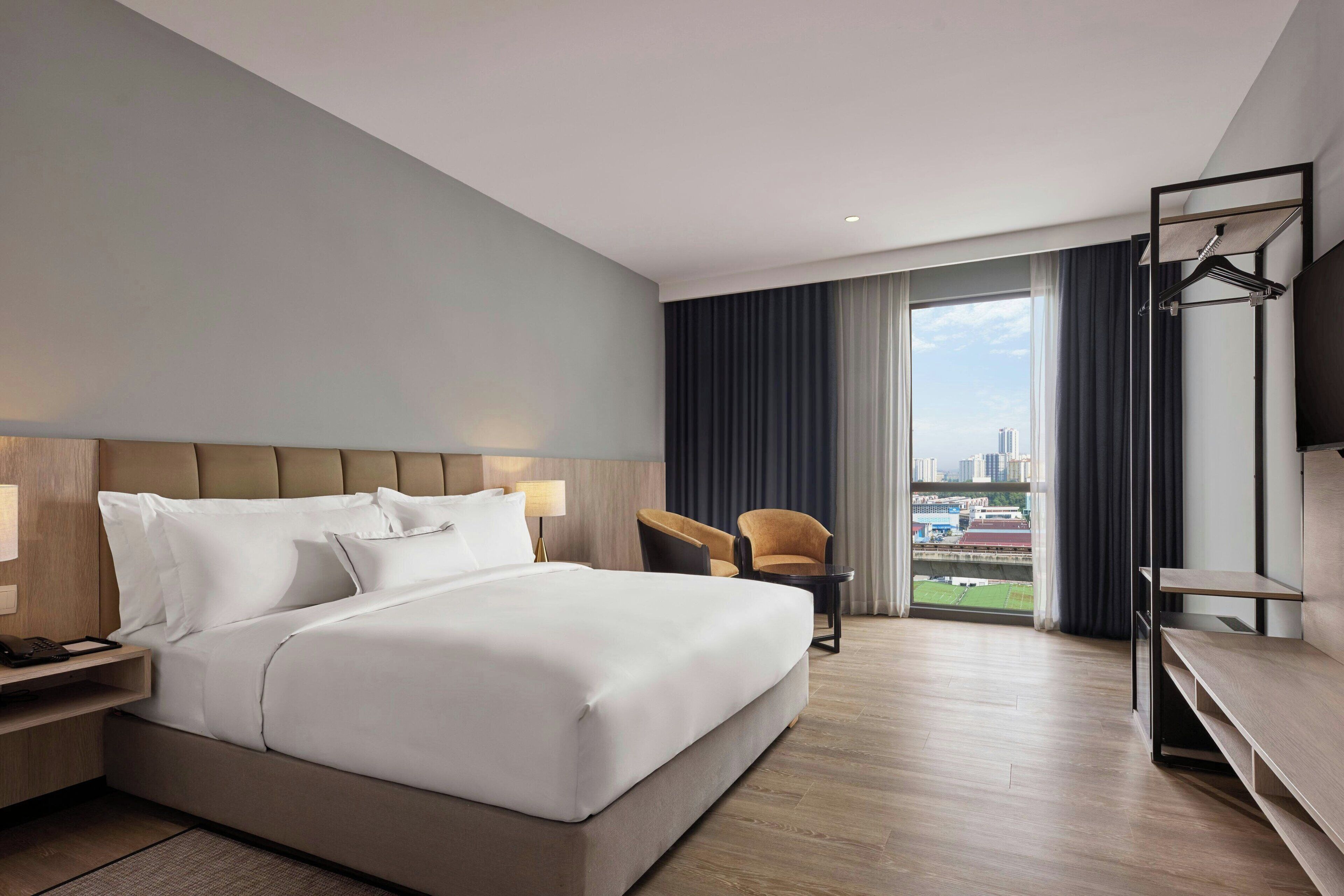 Junior Suite, 1 Bedroom | In-room safe, desk, blackout drapes, soundproofing