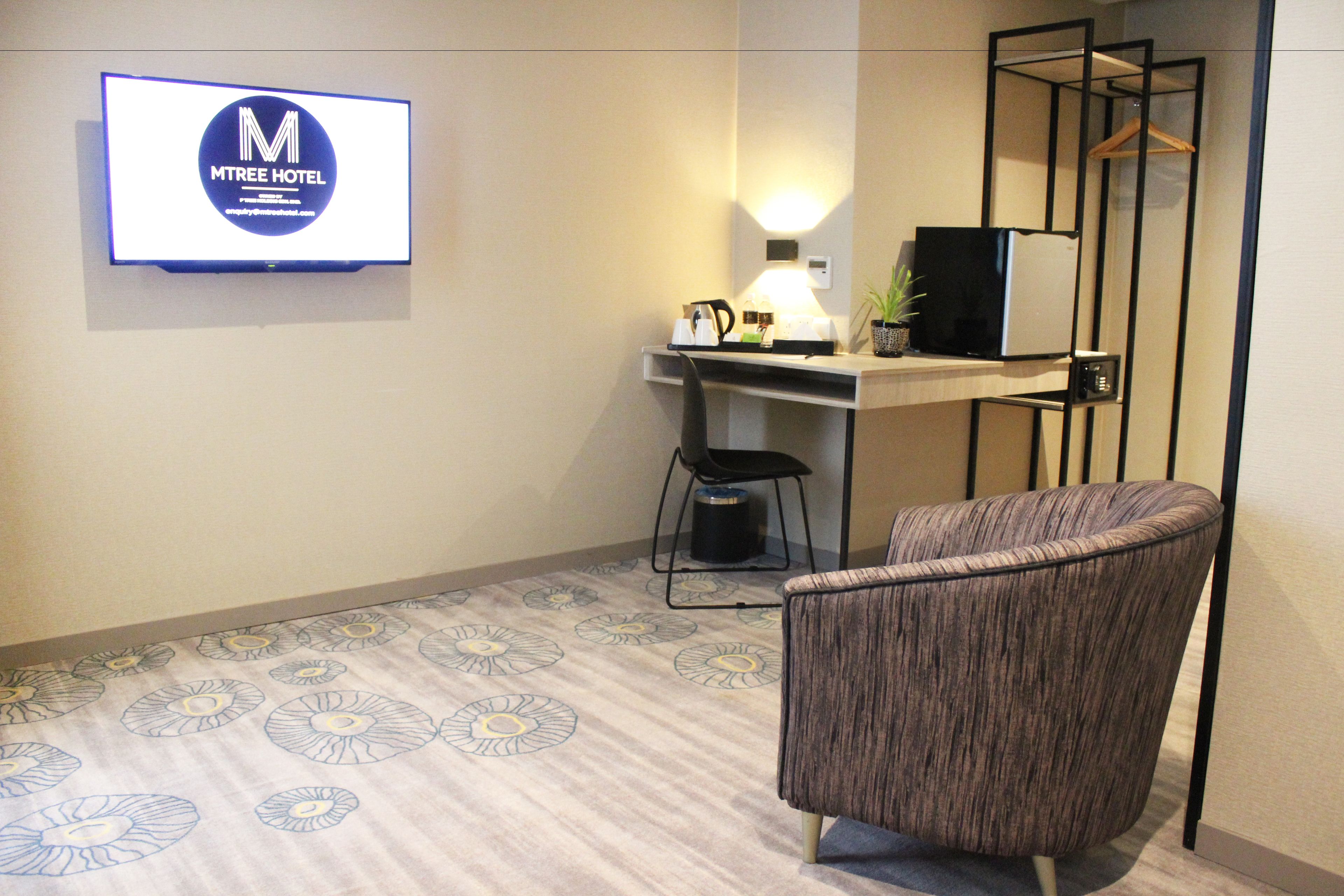 junior suite | in-room safe, desk, blackout curtains, soundproofing