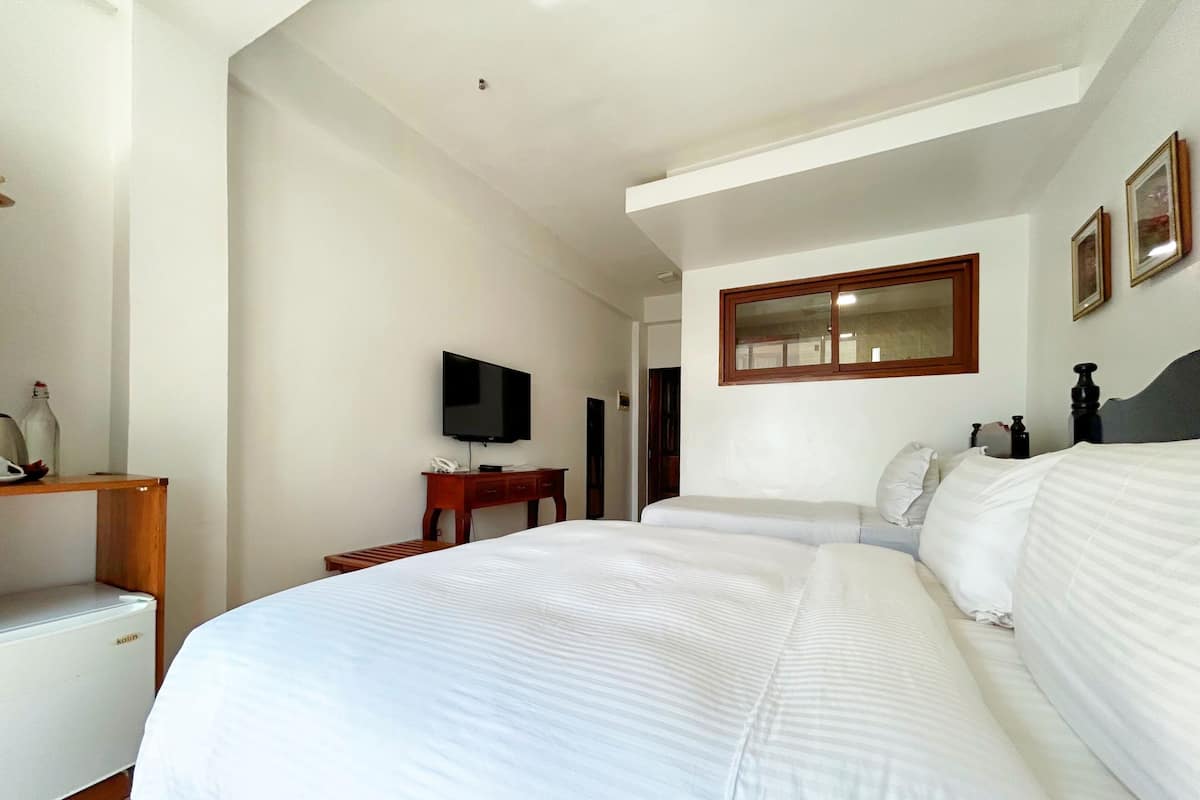 Habitación triple Premier, vista al océano | Sábanas de algodón egipcio y ropa de cama de alta calidad