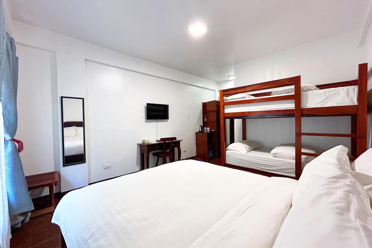 Forest Bldg - Family Room | Egyptian cotton sheets, premium bedding, in-room safe, blackout curtains