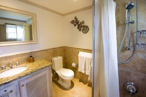 Combined shower/bathtub, hair dryer, towels - Terraces Condos at St. Lawrence Gap (St. Lawrence Gap)