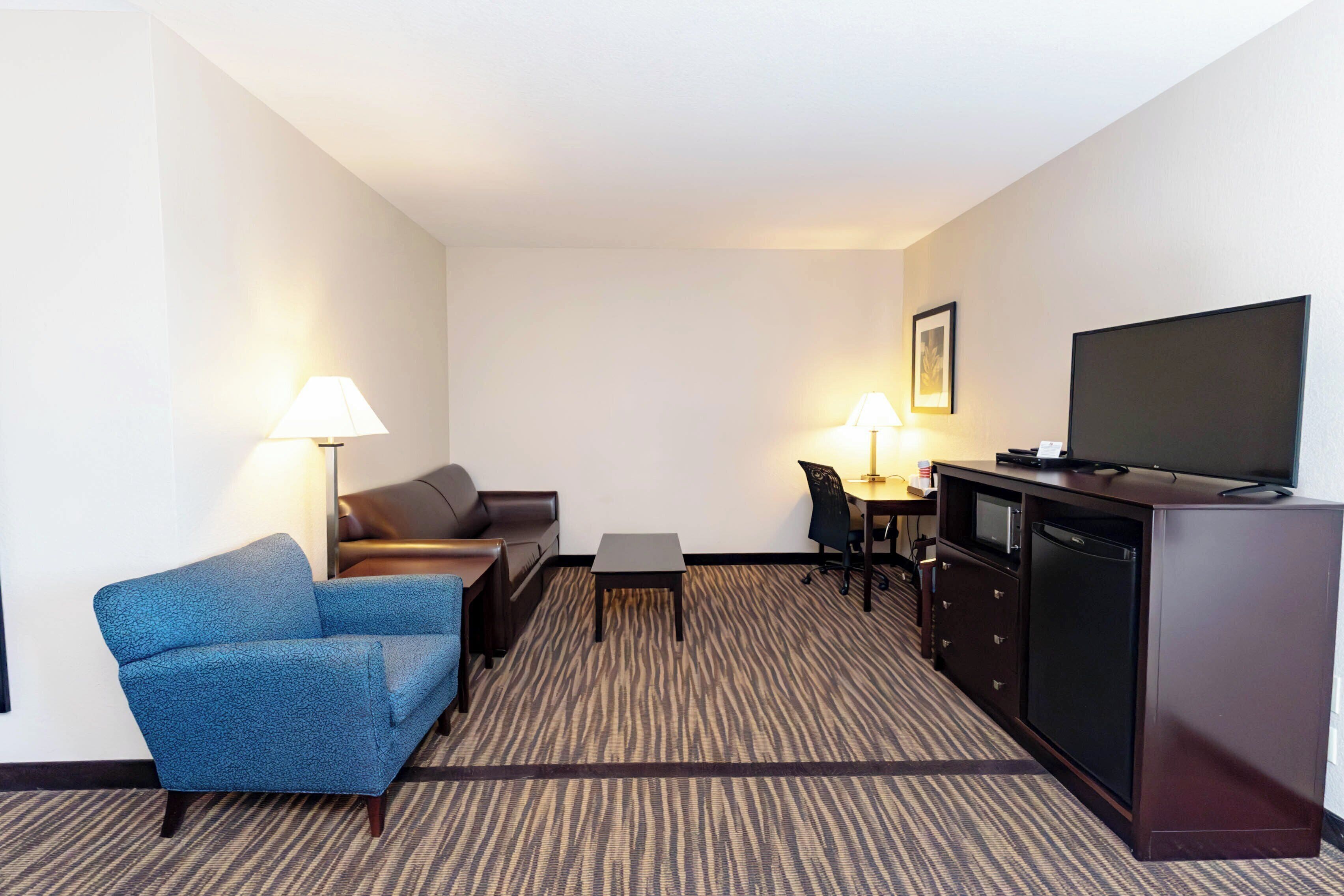 desk, blackout curtains, iron/ironing board, free rollaway beds