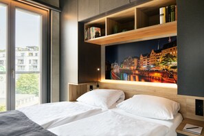 Premium bedding, in-room safe, individually decorated