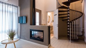 Cabin (Bustan) | Living area | Flat-screen TV - Ein Zivan Tourism (Ein Zivan)