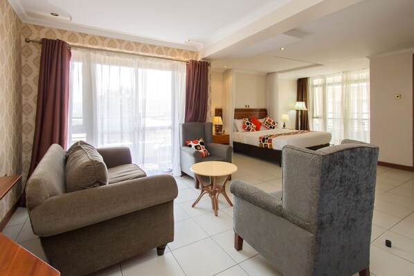 Deluxe Double Room | Living area | TV - Victoria Comfort Inn Kisumu (Kisumu)