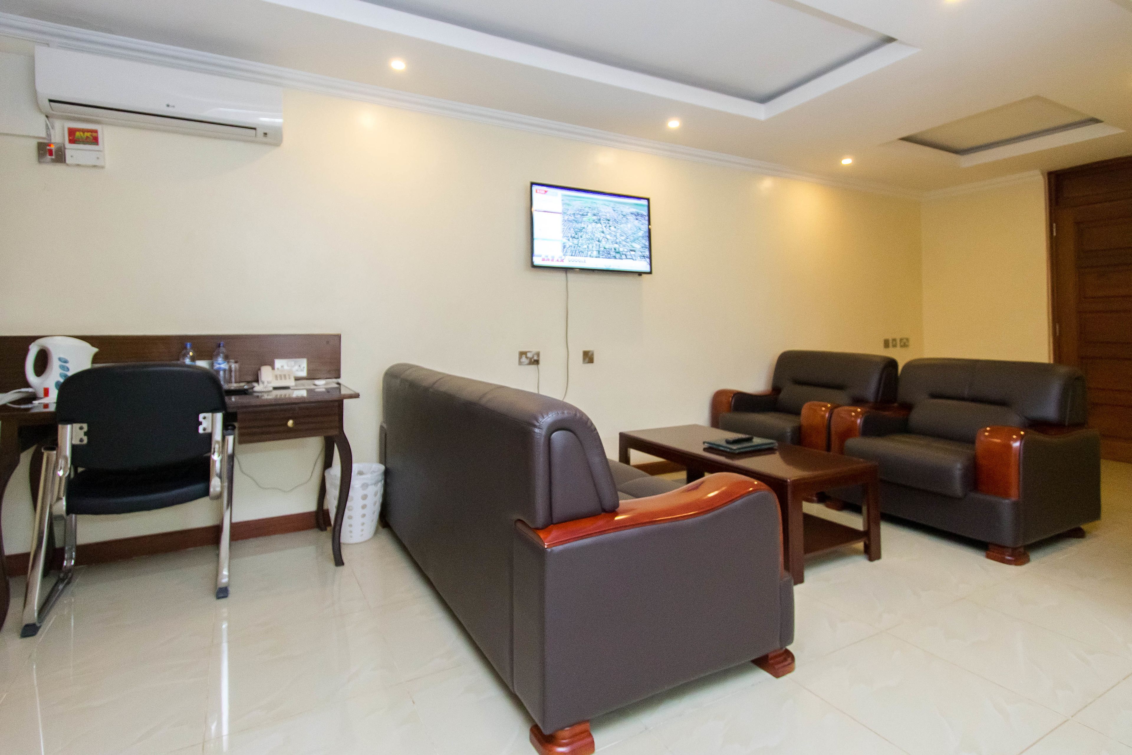 deluxe apartment, 1 bedroom | living room | tv