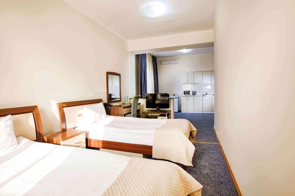 family twin room | minibar, in-room safe, blackout curtains, soundproofing