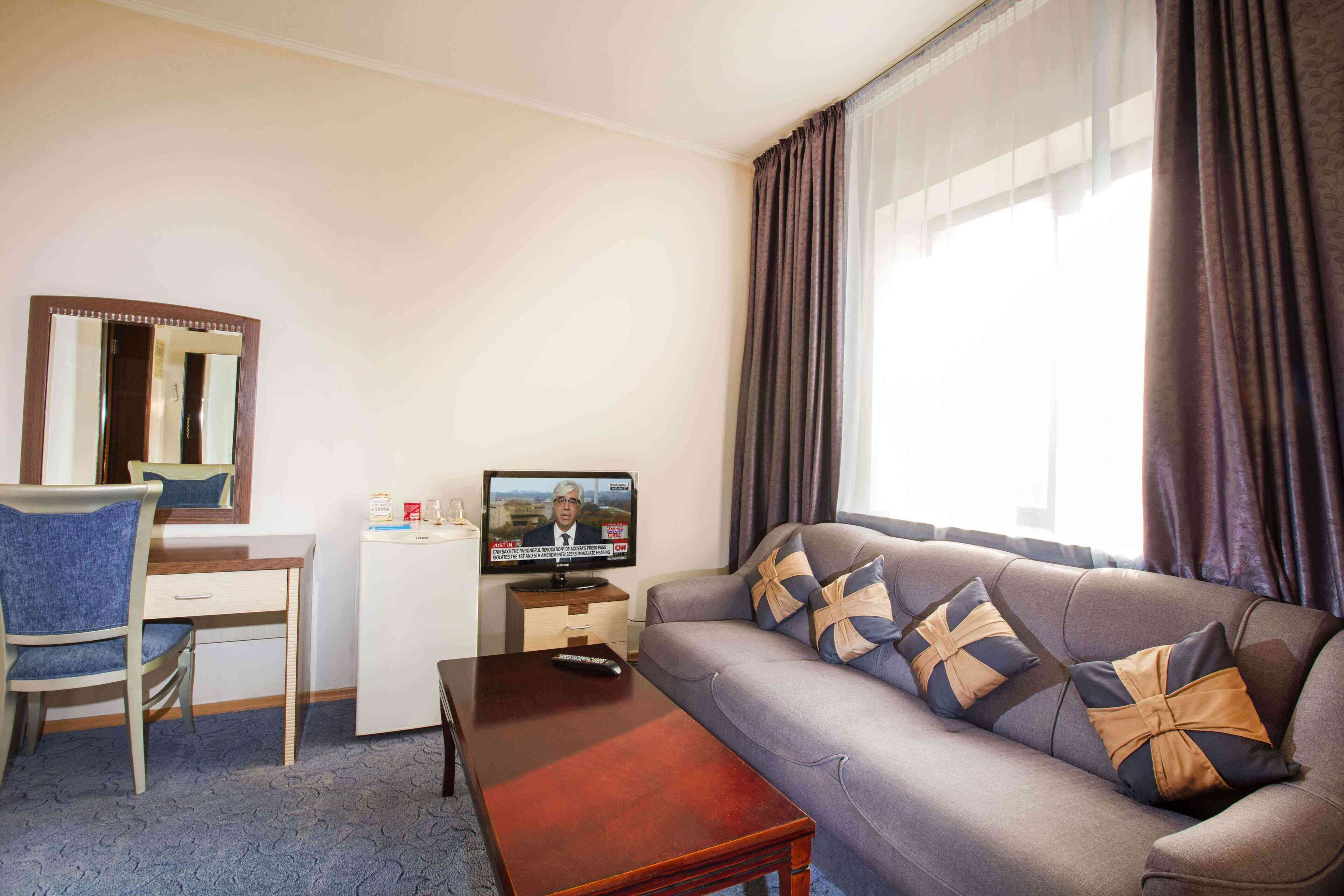 luxury suite | living area | led tv, table football, ping pong