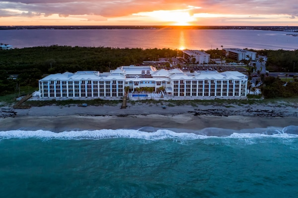On the beach, sun-loungers, beach umbrellas, beach towels