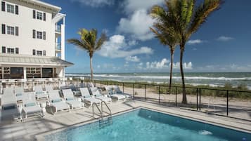 2 outdoor pools, pool umbrellas, sun loungers