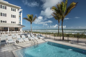 2 outdoor pools, pool umbrellas, sun loungers