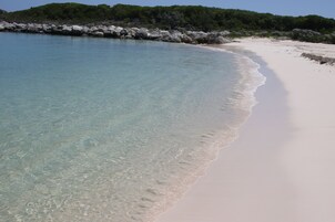 Beach nearby, white sand, free beach cabanas, sun loungers