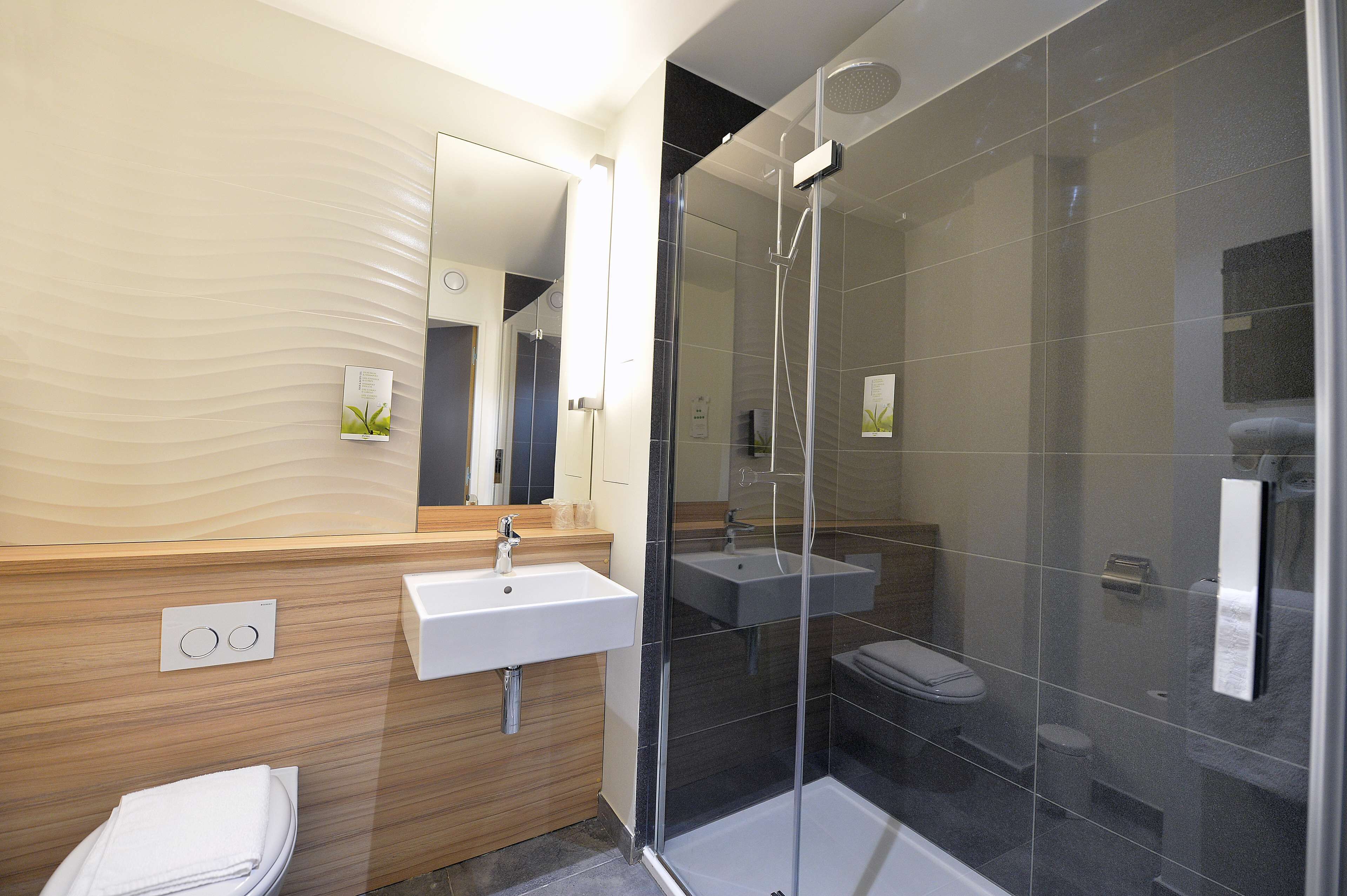 Shower, eco-friendly toiletries, hair dryer, towels