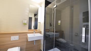 Shower, eco-friendly toiletries, hair dryer, towels