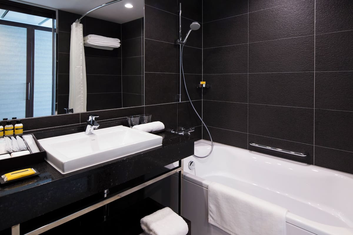 shower, designer toiletries, hair dryer, bathrobes