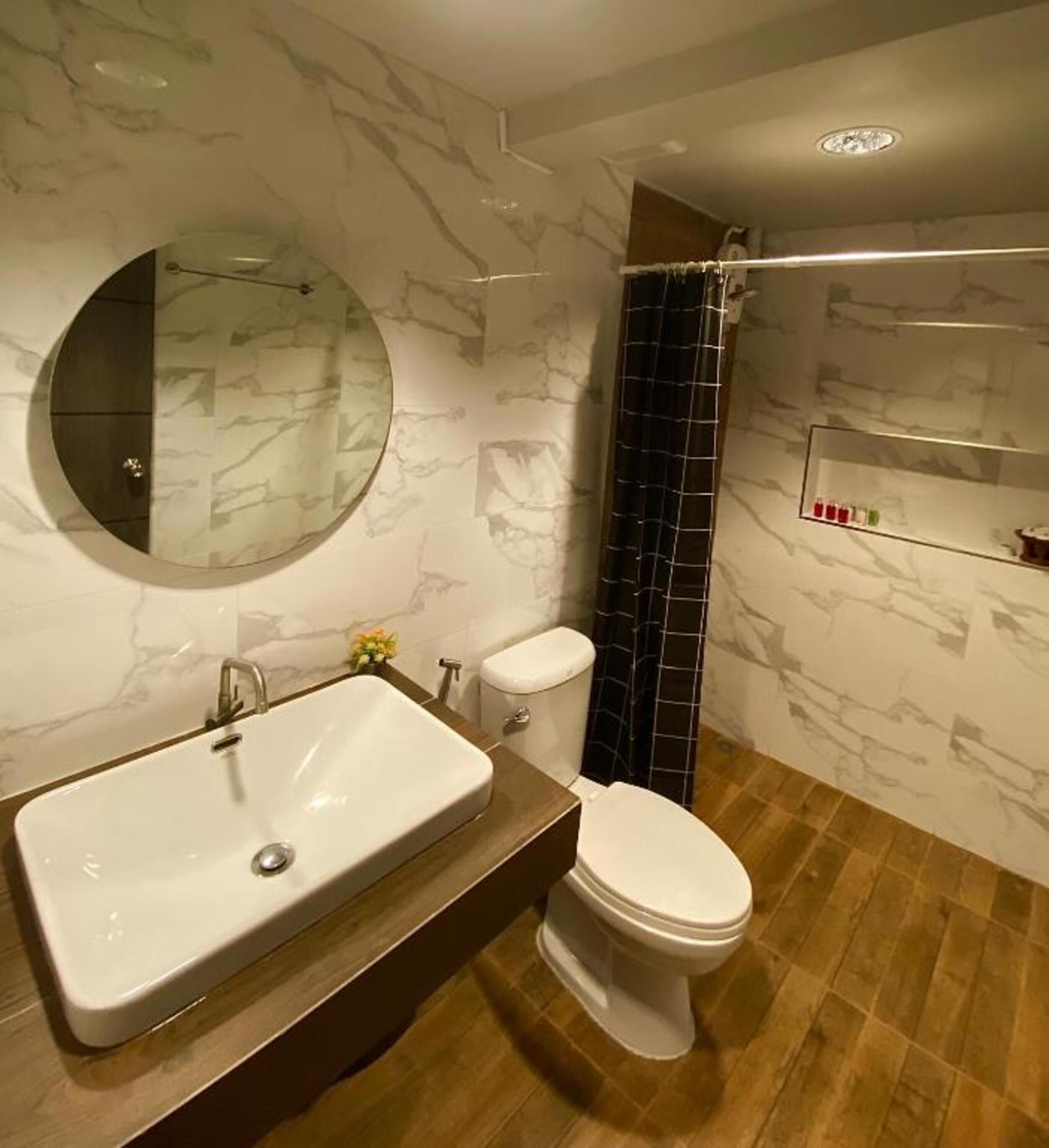 family room, private bathroom | bathroom | shower, free toiletries, towels