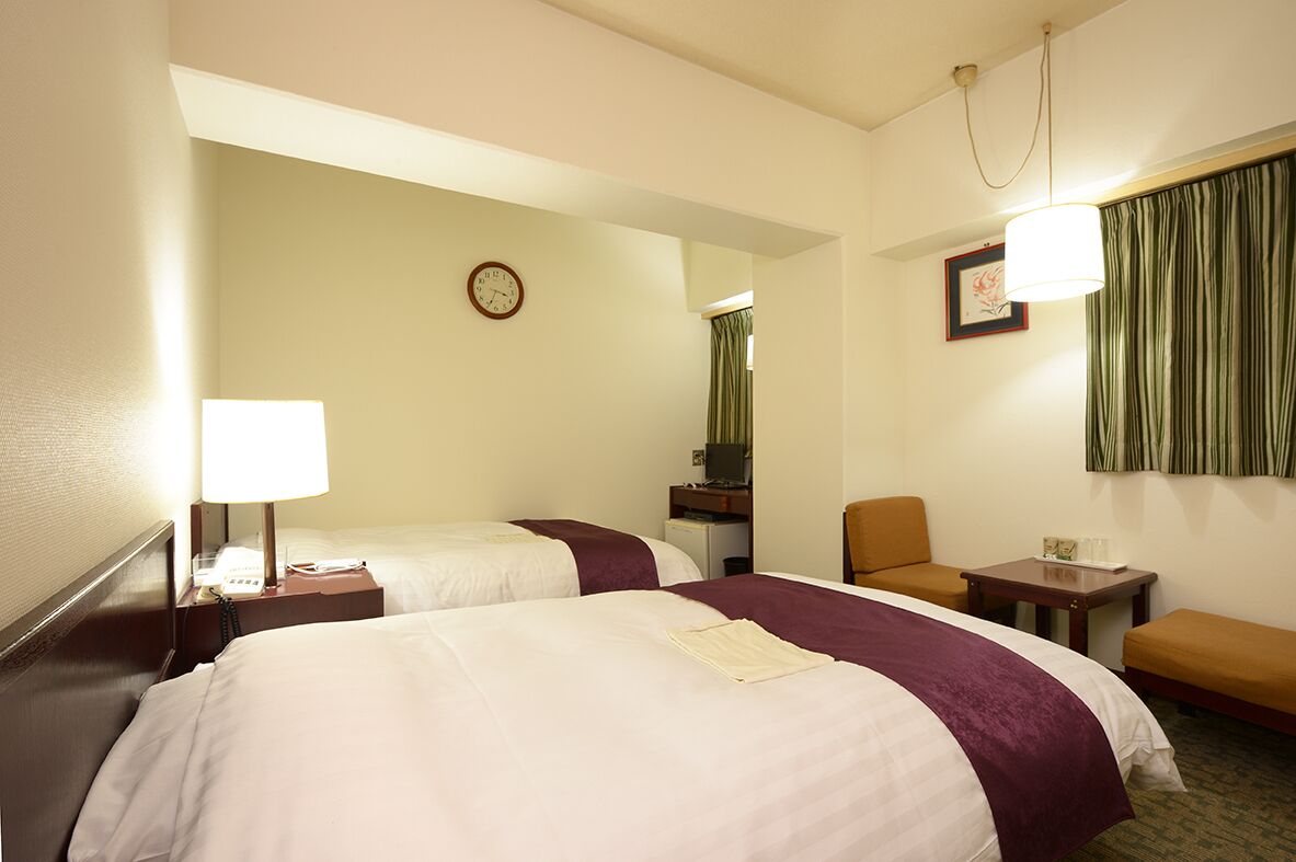 Desk, laptop workspace, free WiFi, bed sheets