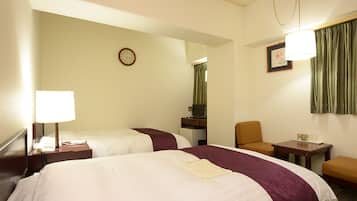 Desk, laptop workspace, free WiFi, bed sheets