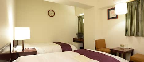 Desk, laptop workspace, free WiFi, bed sheets