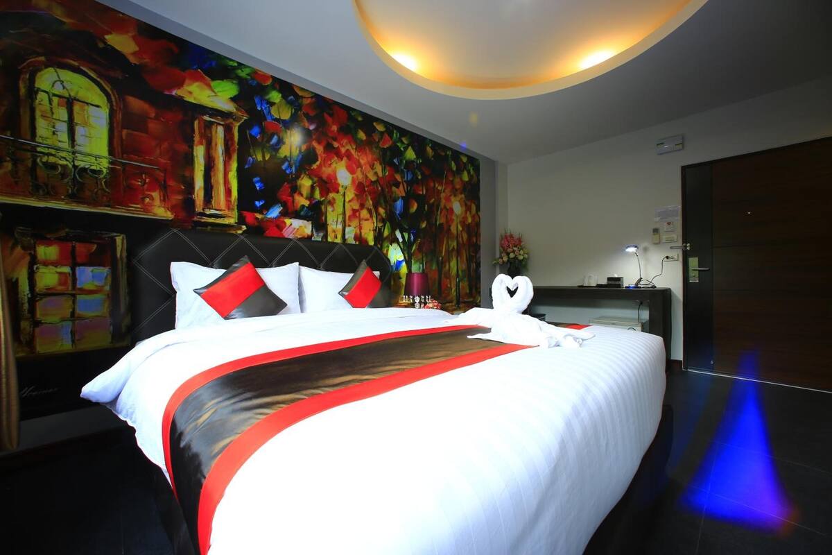 Habitación superior | Escritorio, camas extra y wifi gratis