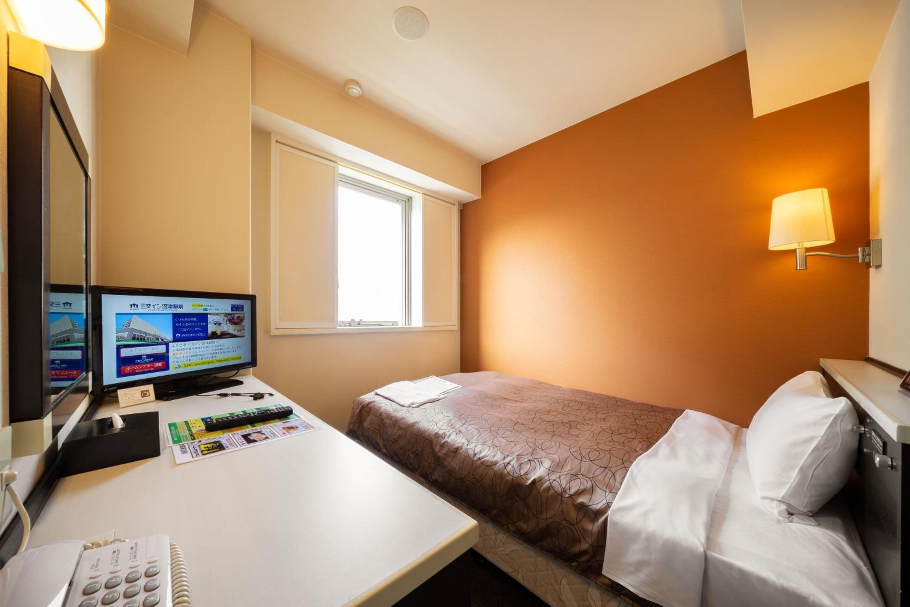 desk, blackout curtains, iron/ironing board, free wifi