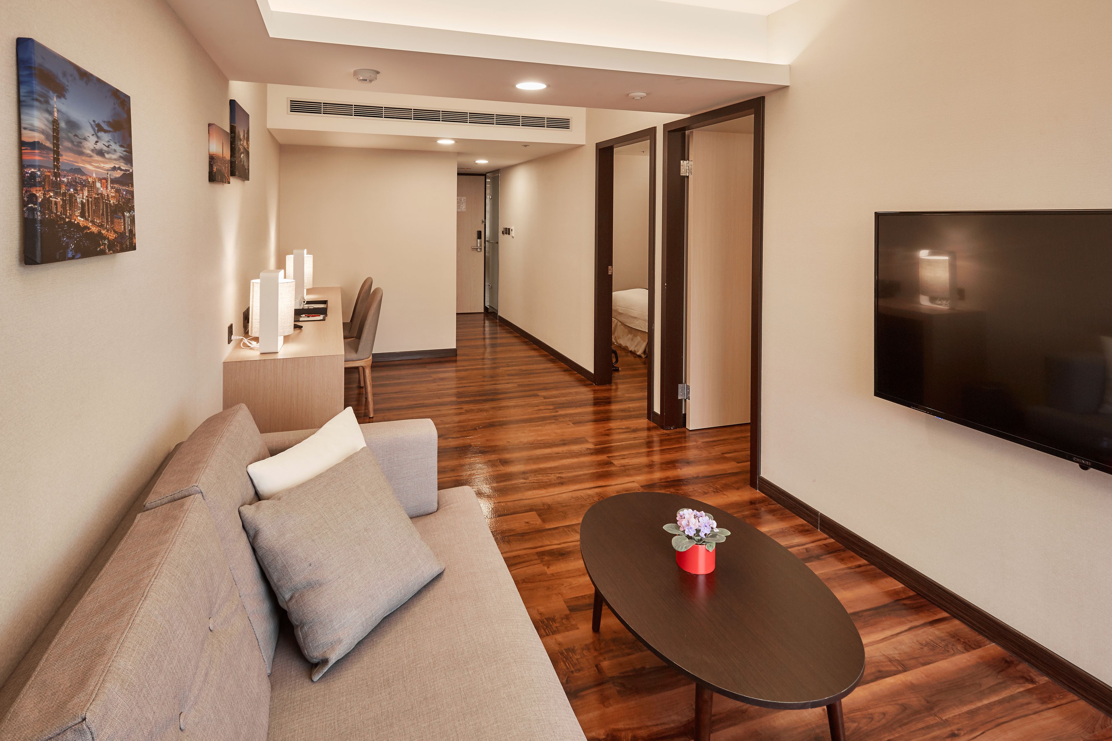 family suite, 2 bedrooms, hot tub, tower | living area | lcd tv