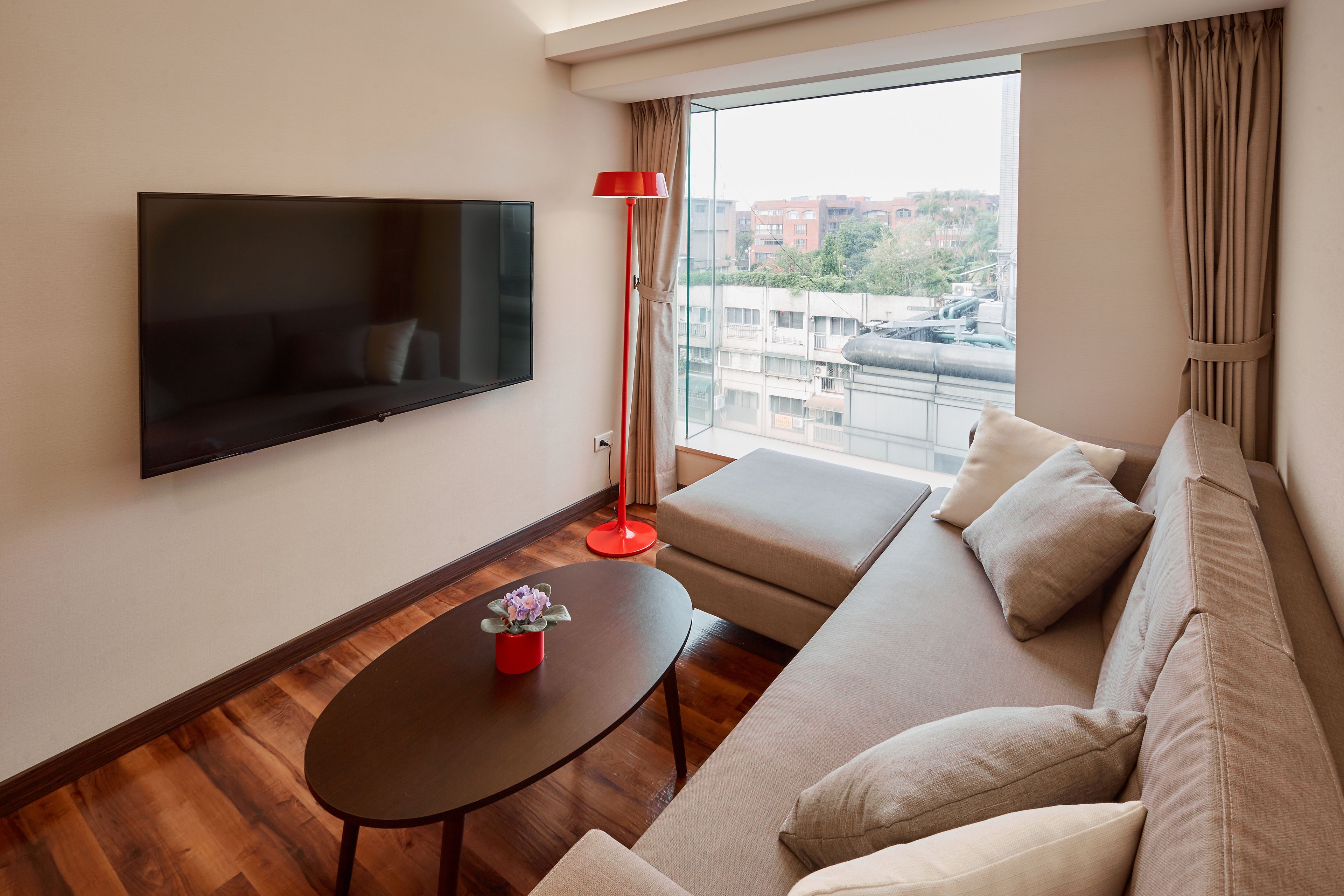 family suite, 2 bedrooms, hot tub, tower | living area | lcd tv