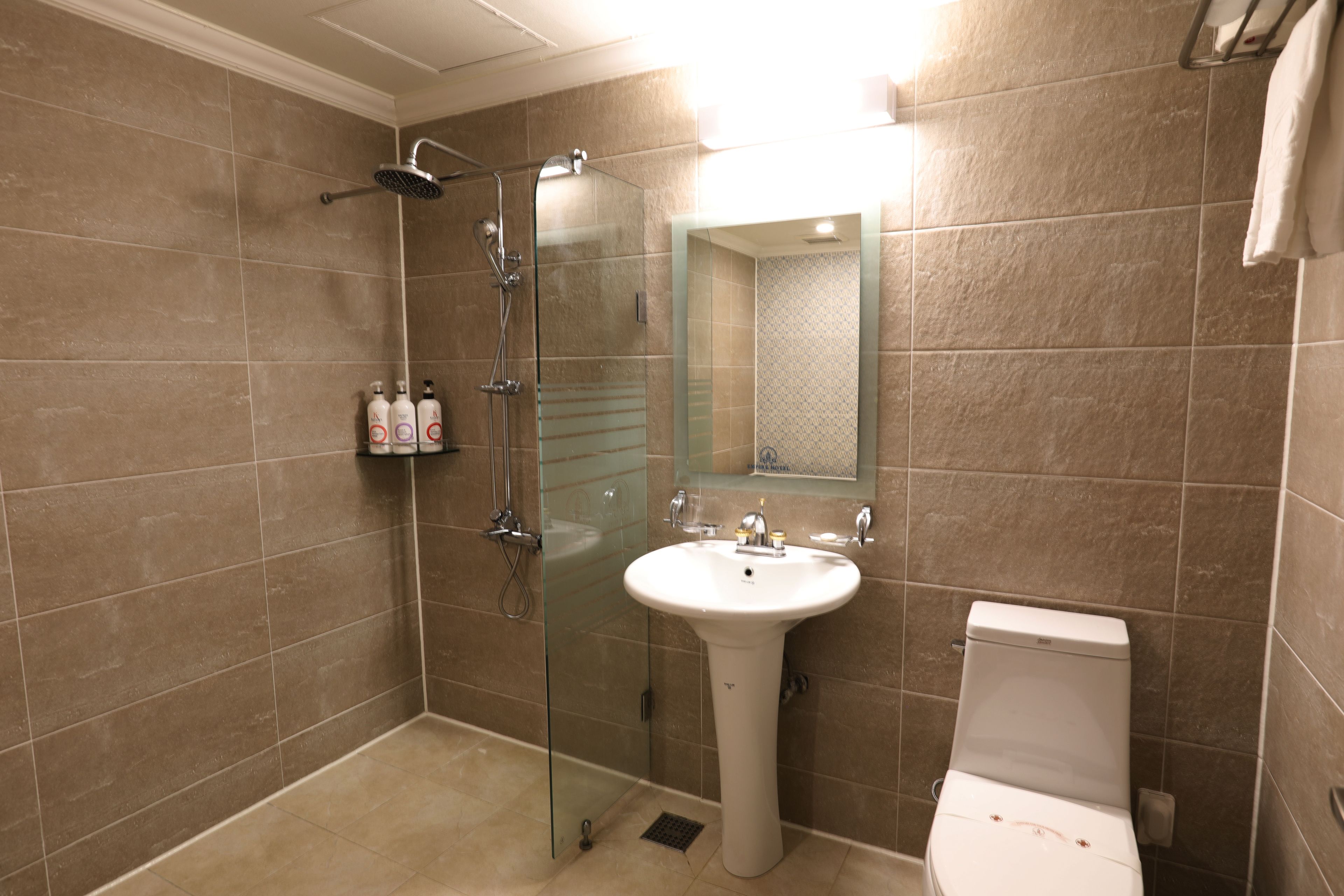 combined shower/bathtub, deep-soaking bathtub, designer toiletries