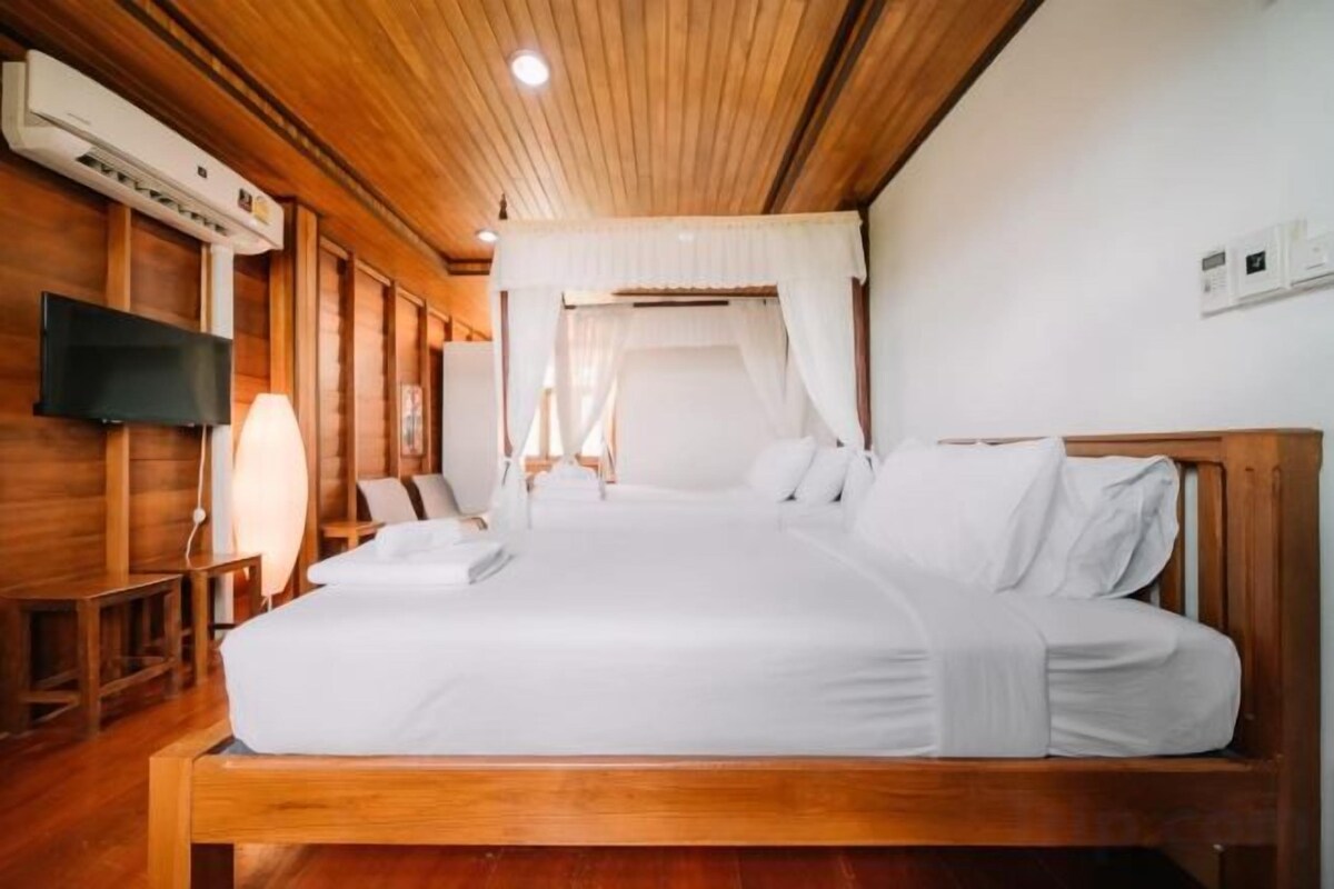 Desk, blackout drapes, rollaway beds (surcharge), WiFi (free)