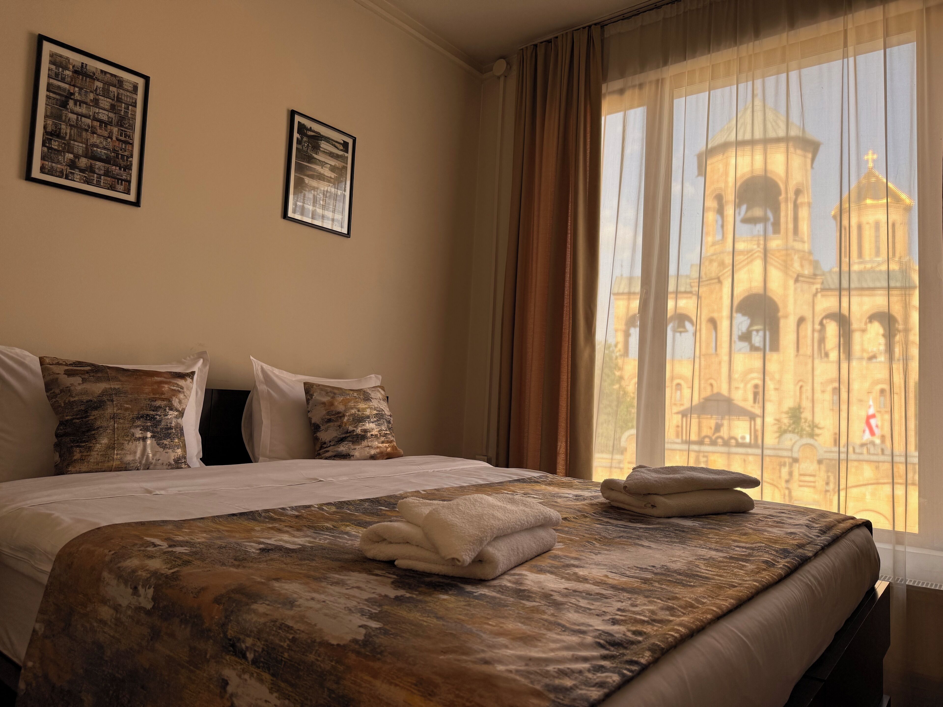 Standard Double Room | Minibar, in-room safe, desk, blackout curtains