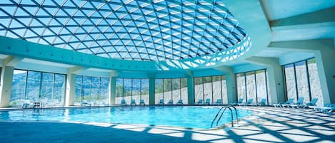 Indoor pool, 2 outdoor pools, open 8 AM to 11:00 PM, pool umbrellas
