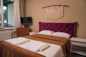 Double Room | Minibar, in-room safe, free cribs/infant beds, free WiFi