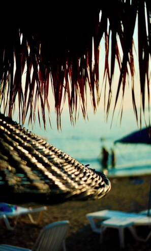 Private beach, sun loungers, beach umbrellas