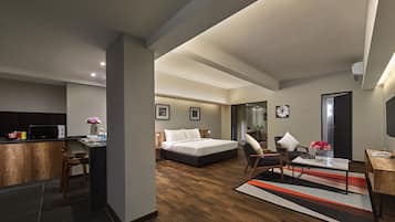 Standard Suite, 1 Queen Bed | Living area | LED TV, fireplace