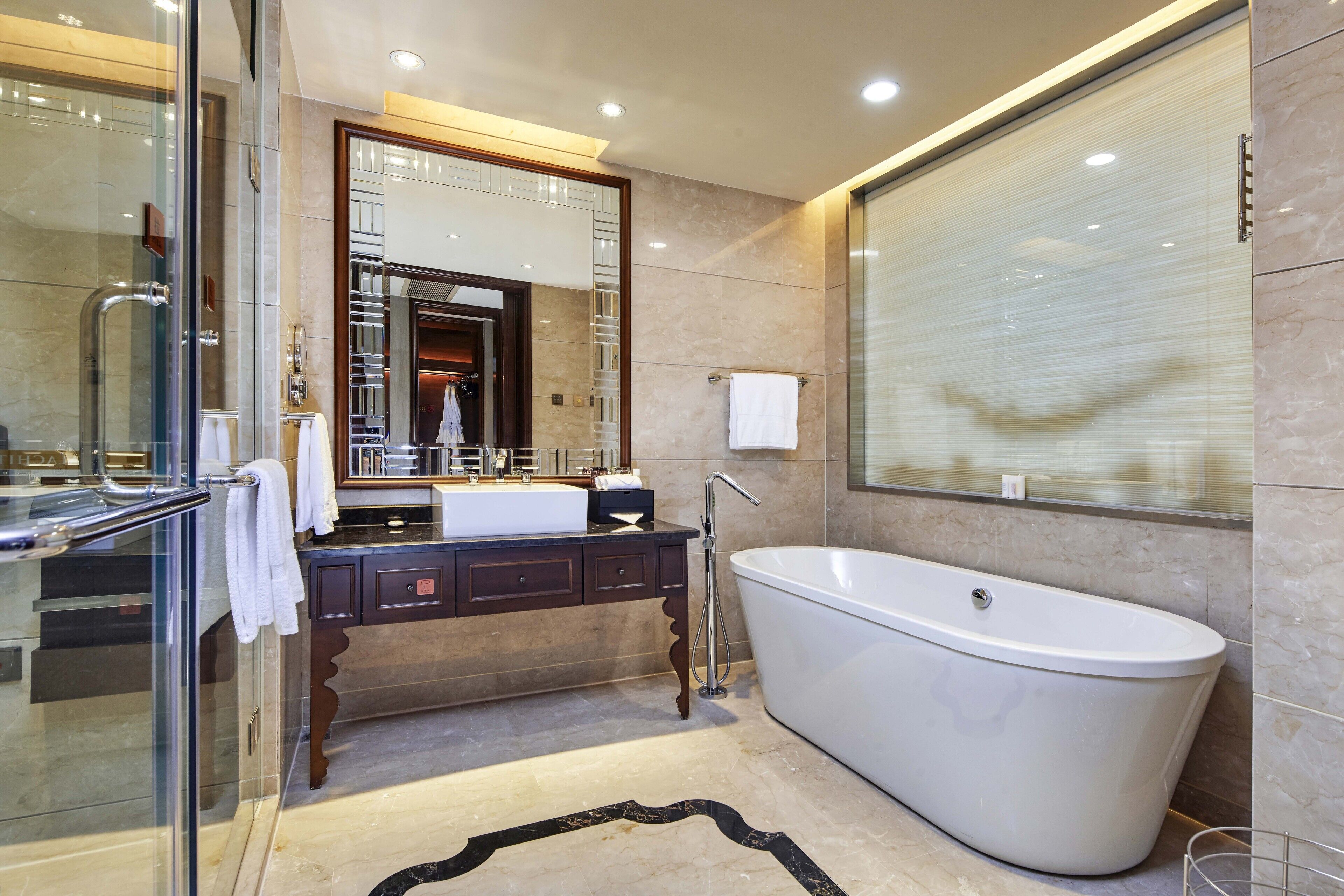 separate bathtub and shower, free toiletries, hair dryer, dressing gowns