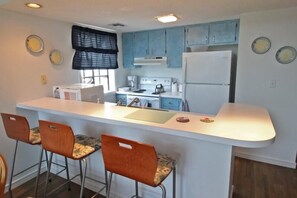 Condo, 2 Bedrooms | Private kitchen | Fridge, microwave, coffee/tea maker