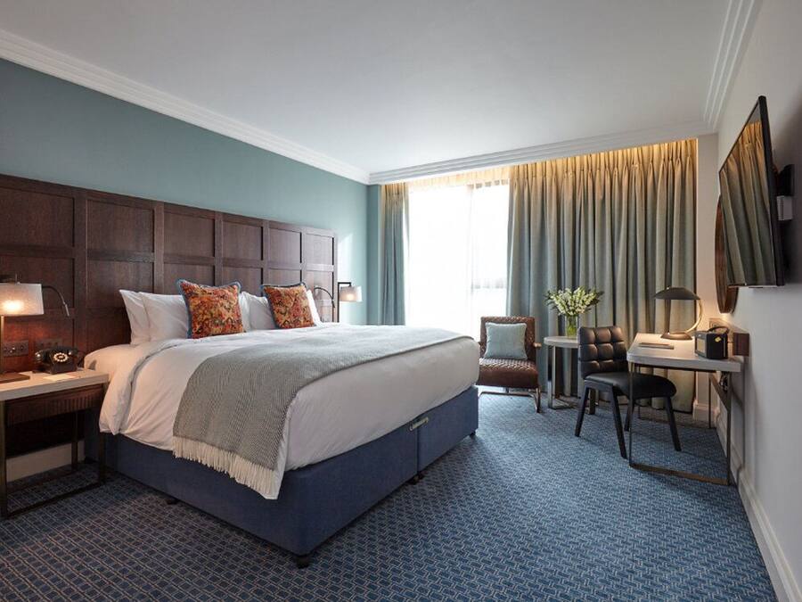 Roupas de cama premium, cofres nos quartos, individualmente decorados