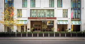 The Clayton Hotel facade with a modern design, large windows, and a clear entrance. - Clayton Hotel Cambridge (Cambridge)