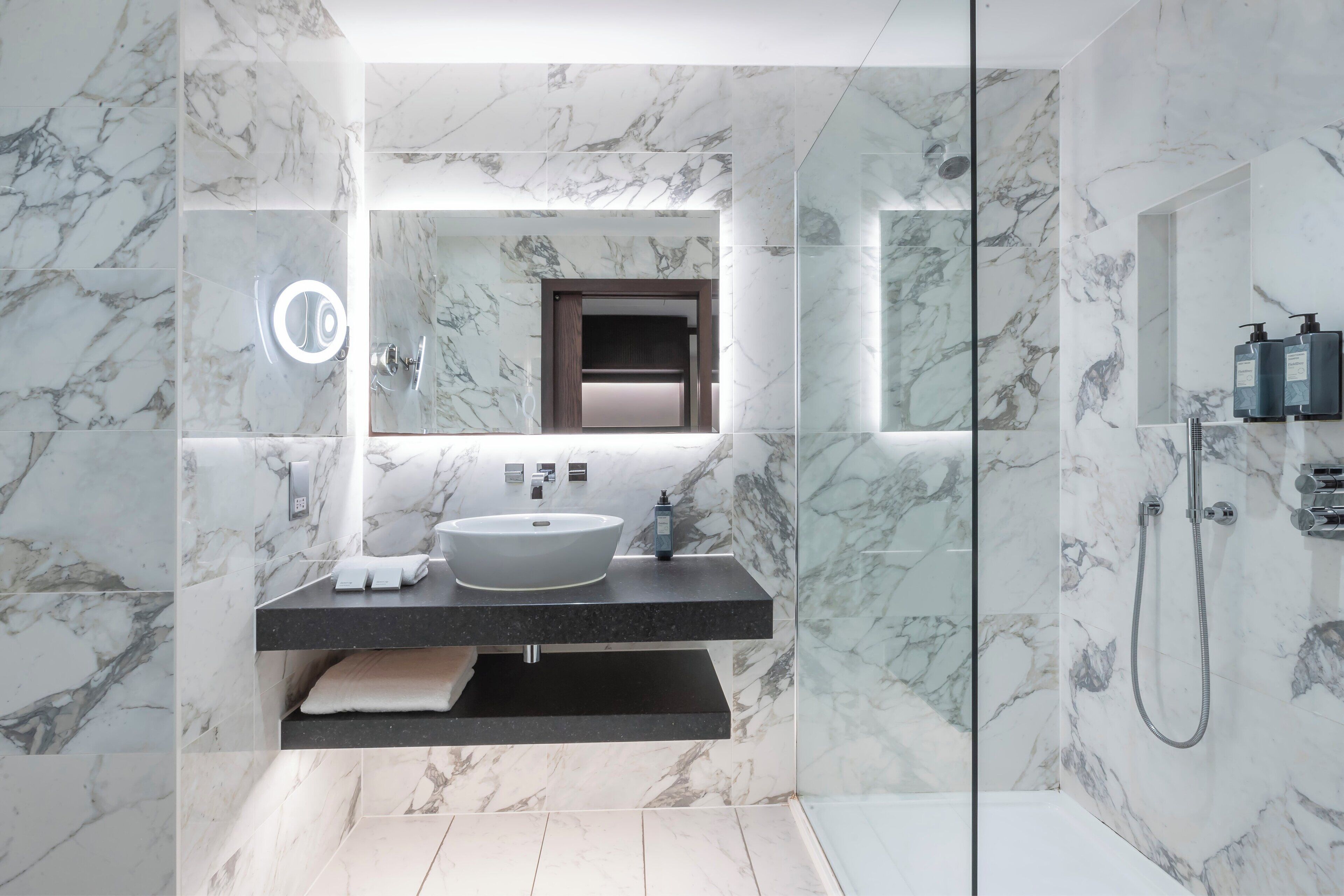 shower, free toiletries, hair dryer, towels