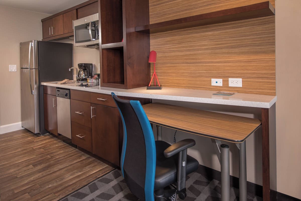 full-sized fridge, microwave, stovetop, dishwasher