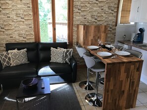 Deluxe Studio Suite, 1 Bedroom, Hot Tub, Pool View | Living area | Flat-screen TV, pay movies - Les Plantous de Severo (Cenac-et-Saint-Julien)