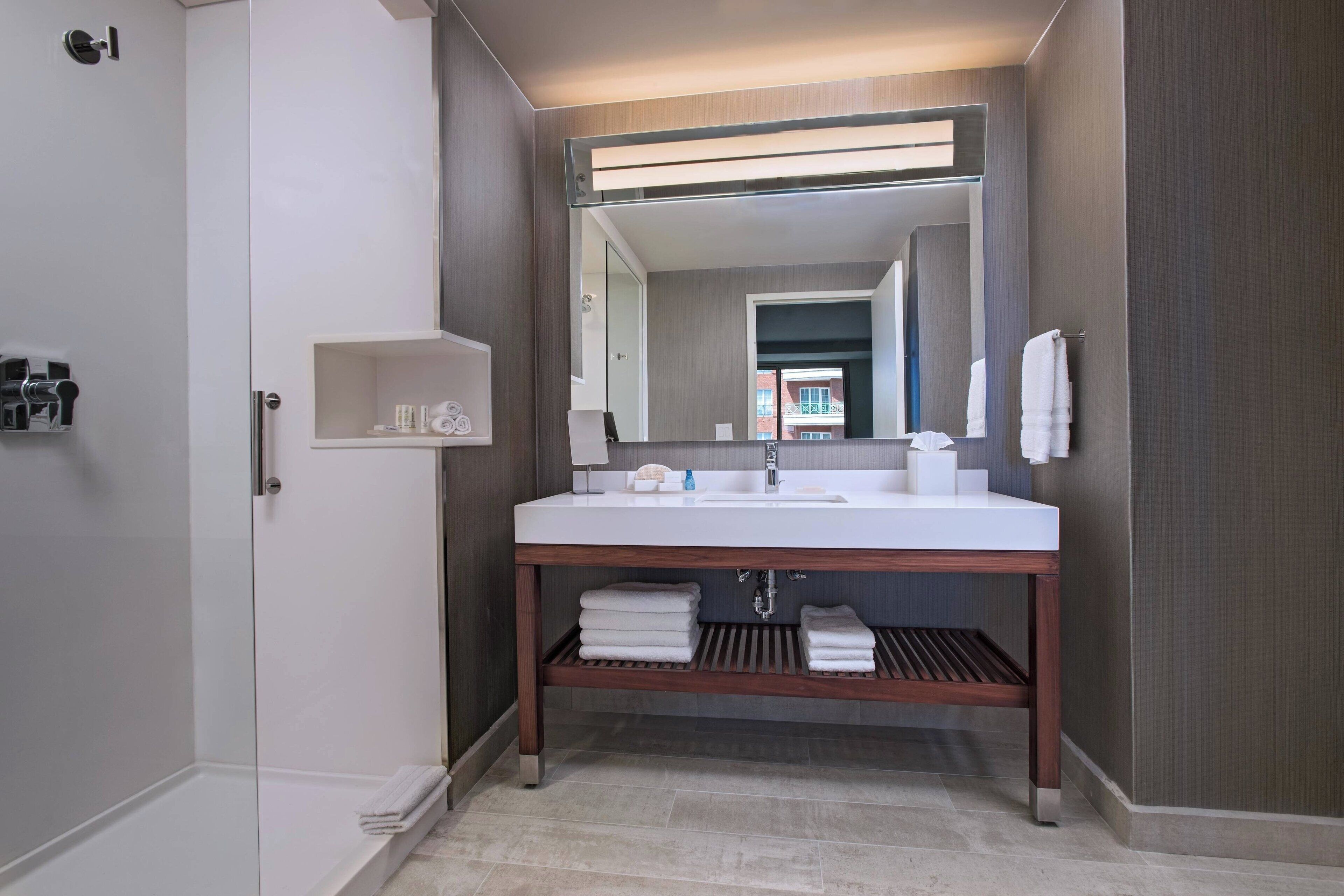 suite, 1 king bed with sofa bed, non smoking | bathroom | shower, free toiletries, hair dryer, towels