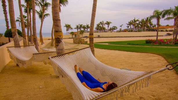A hammock on a sandy beach with palm trees and a view of the ocean. - Las Mananitas LM 3 Villa 3501 3 Bedroom Villa By Seaside Los Cabos (San José del Cabo)