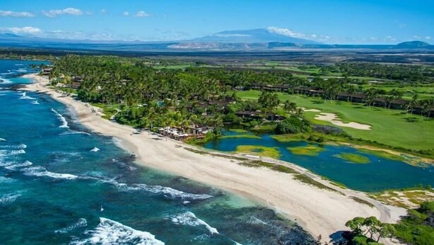 A coastal resort with a beach, golf course, and lush greenery. - 104A Waiulu Street Hualalai (Kailua-Kona)