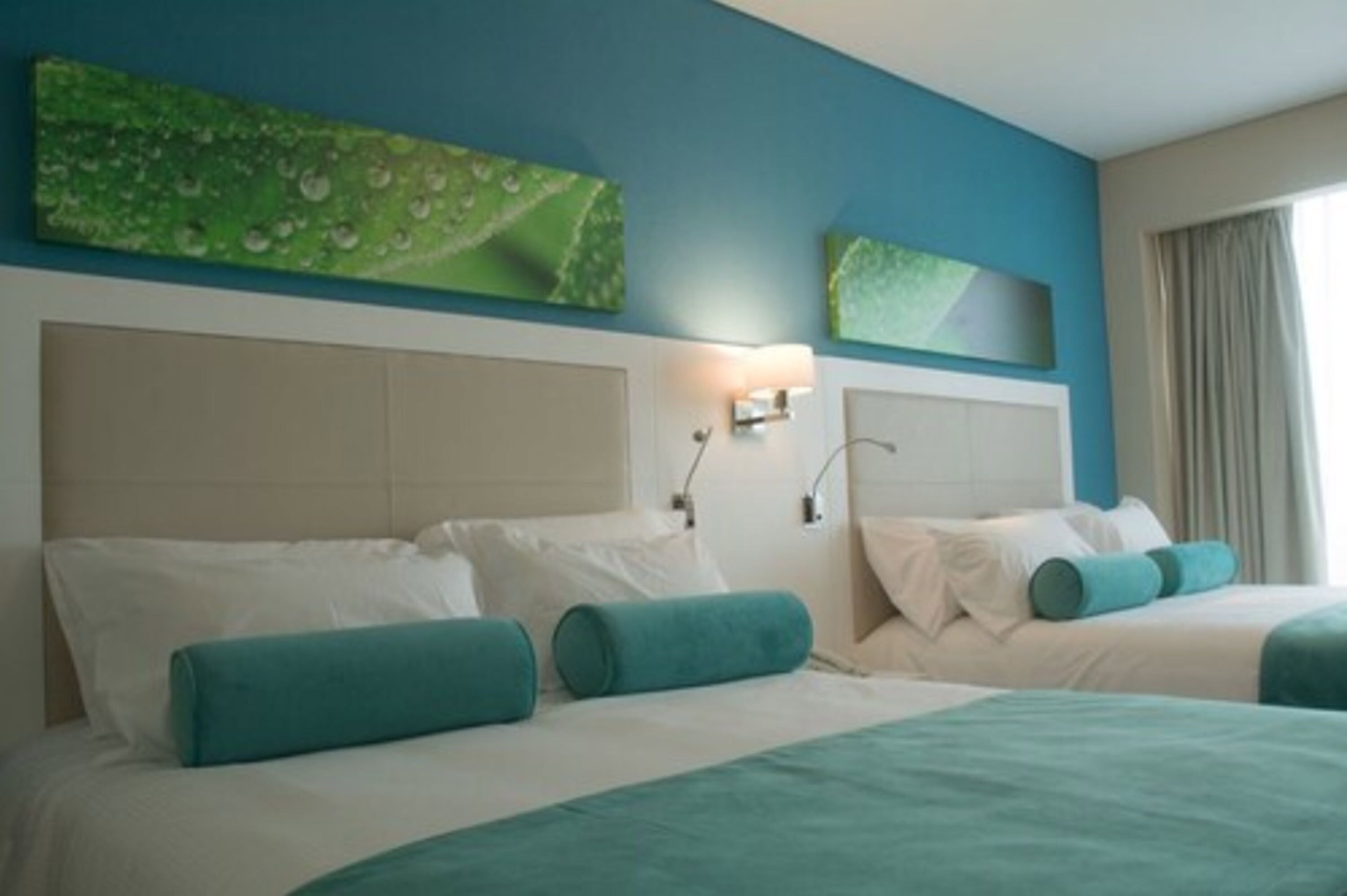 standard double room, 2 queen beds | premium bedding, minibar, in-room safe, desk