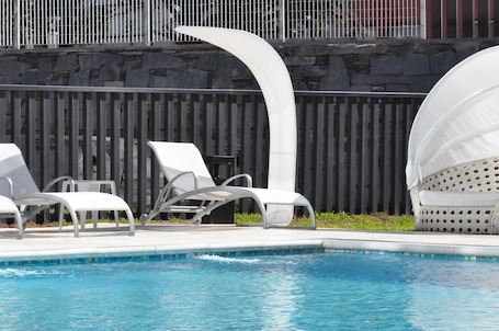 Indoor pool, seasonal outdoor pool, pool umbrellas, sun loungers