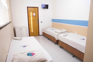 Blackout curtains, iron/ironing board, free WiFi, bed sheets