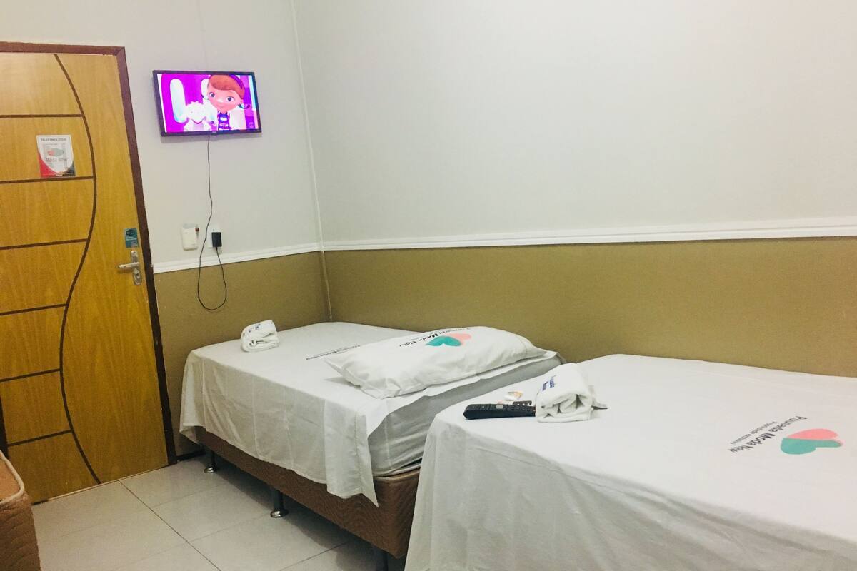 Blackout drapes, iron/ironing board, WiFi (free), bed sheets